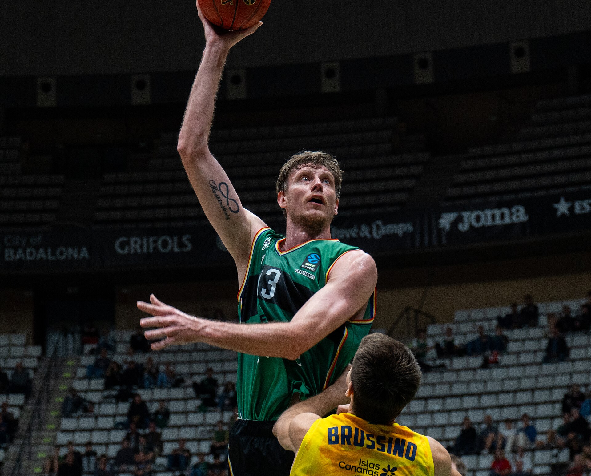 Basketball player Artem Pustovyi shoots while playing for Joventut Badalona in a Eurocup game