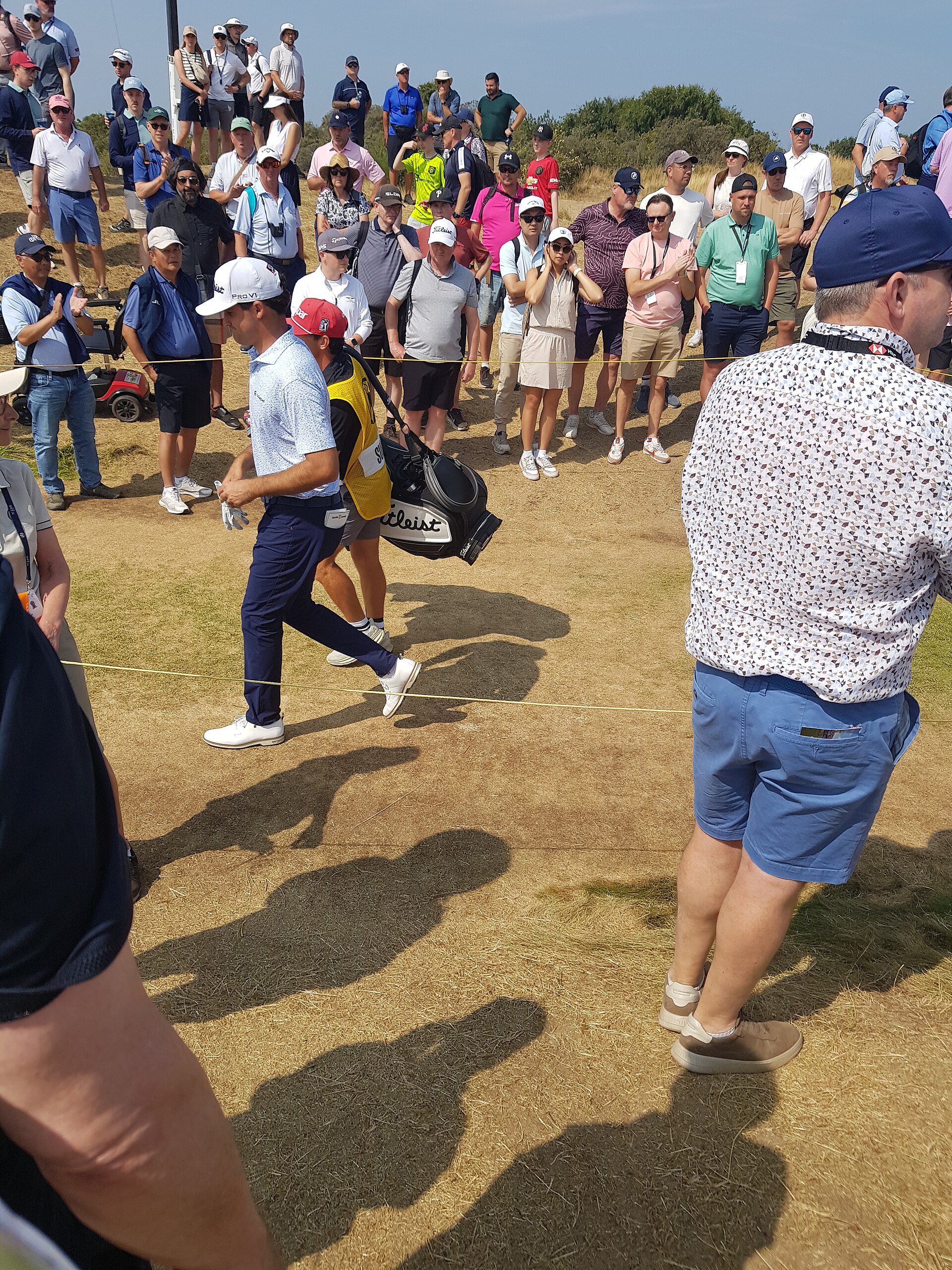 Público en un campo de golf durante el British Open